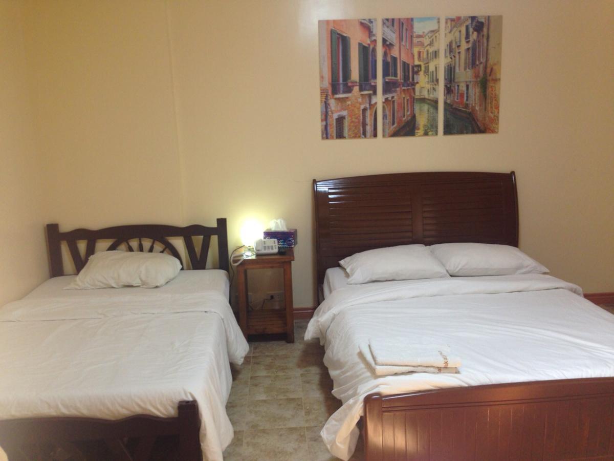 Makati Suites At Travelers Inn Makati City ภายนอก รูปภาพ